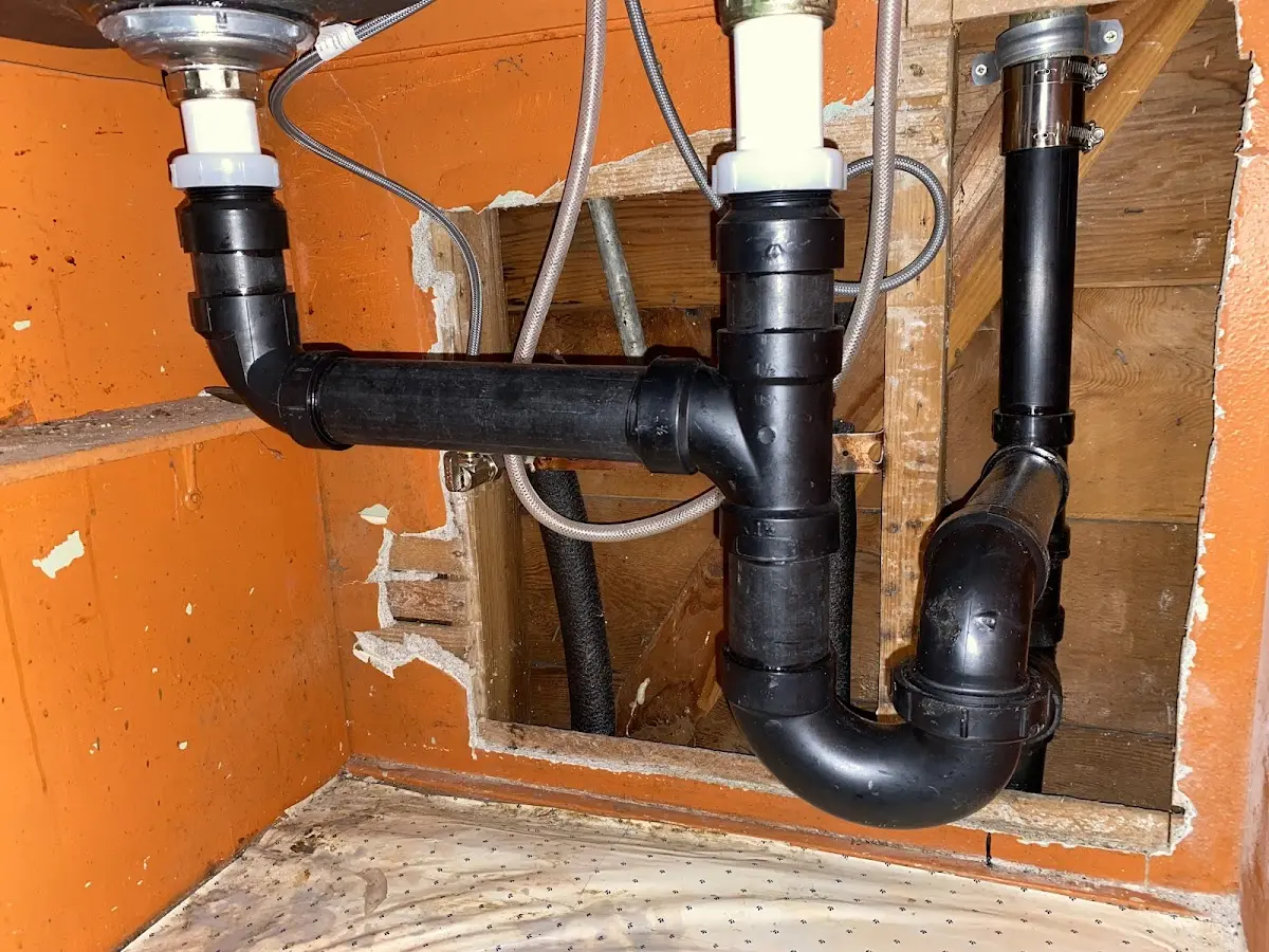 Professional Garbage Disposal Repair equipment and tools on the job in Farmerville